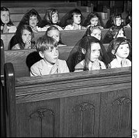 Bobby Greenlease Praying in School Chapel (1953)  GreenleaseFamily.com